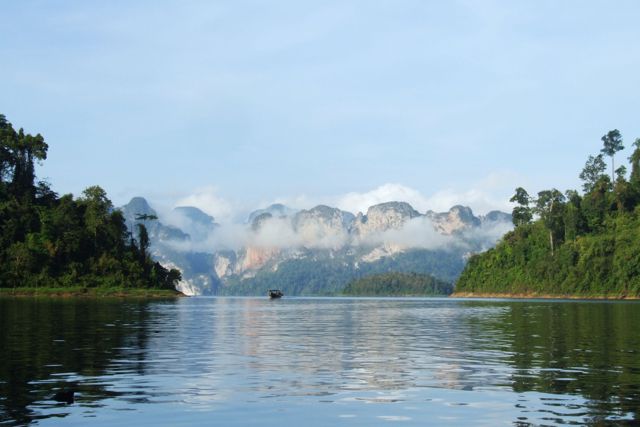 Rajjaprapha Dam — towering limestone cliffs at Cheow Lan Lake
